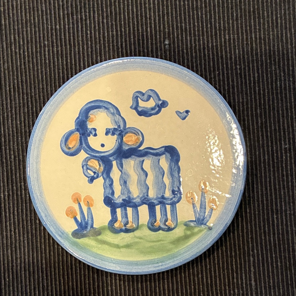M A Hadley lamb trivet.